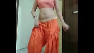 Indian girl Nidhi doing belly dance at home